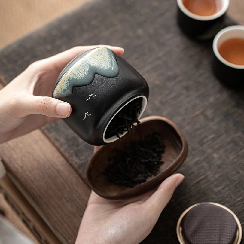 side view of compact 230ml ceramic tea storage caddy