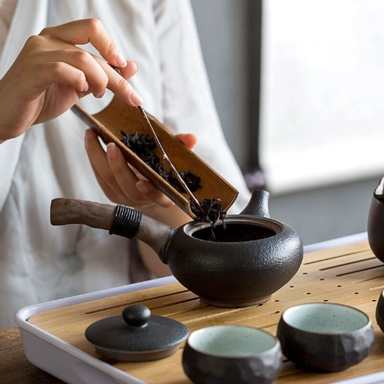 side view of black ceramic side handle teapot 220ml