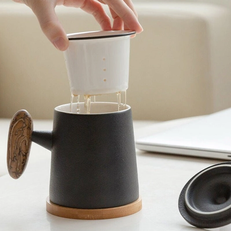 side view of ceramic tea infuser mug with matching ceramic lid