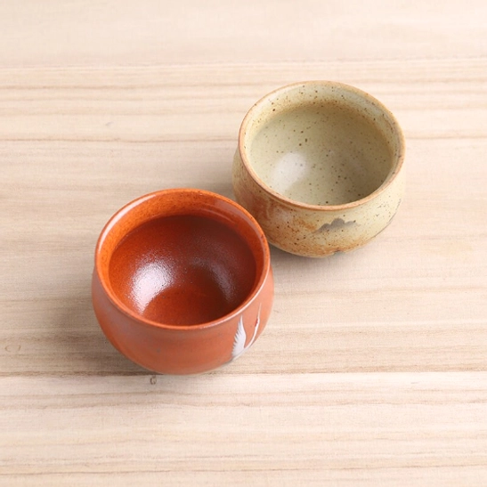 side view of traditional chinese ceramic crane tea cup showing 5cm height