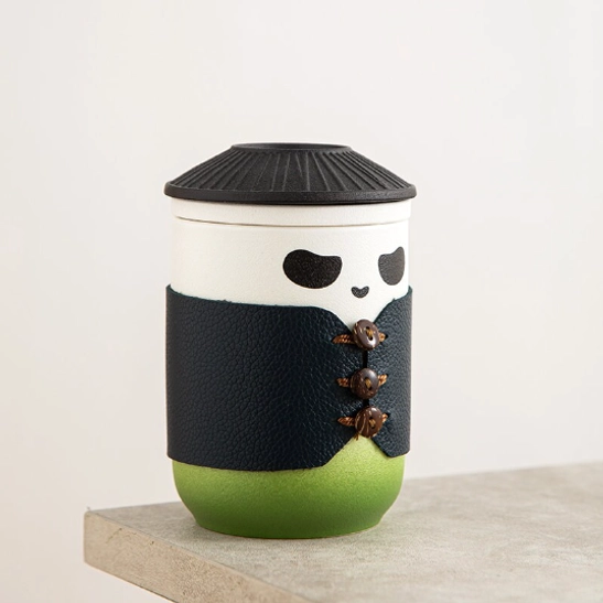 Side view of panda portable tea infuser mug 300ml with decorative sleeve