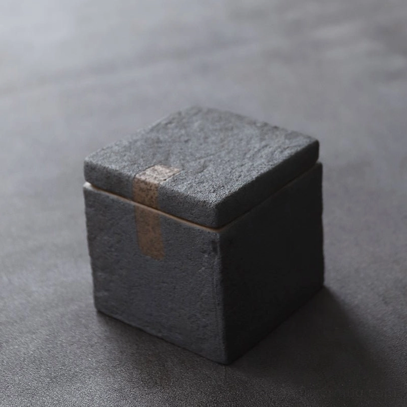 side view of textured ceramic tea storage canister