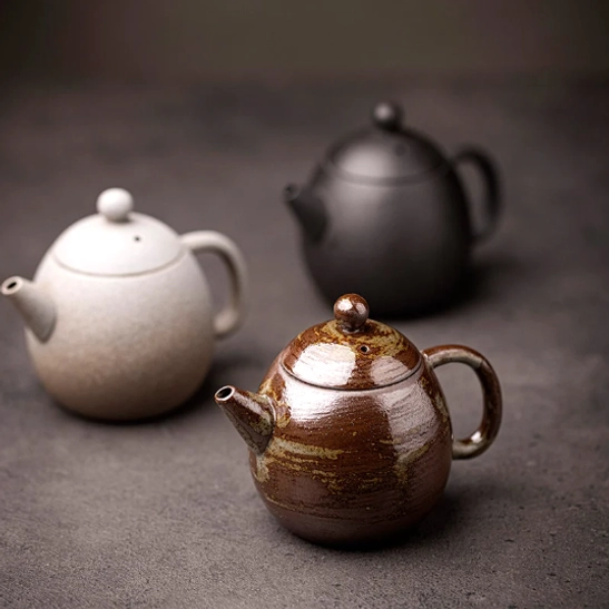 size comparison of 200ml japanese clay teapot next to measuring tape