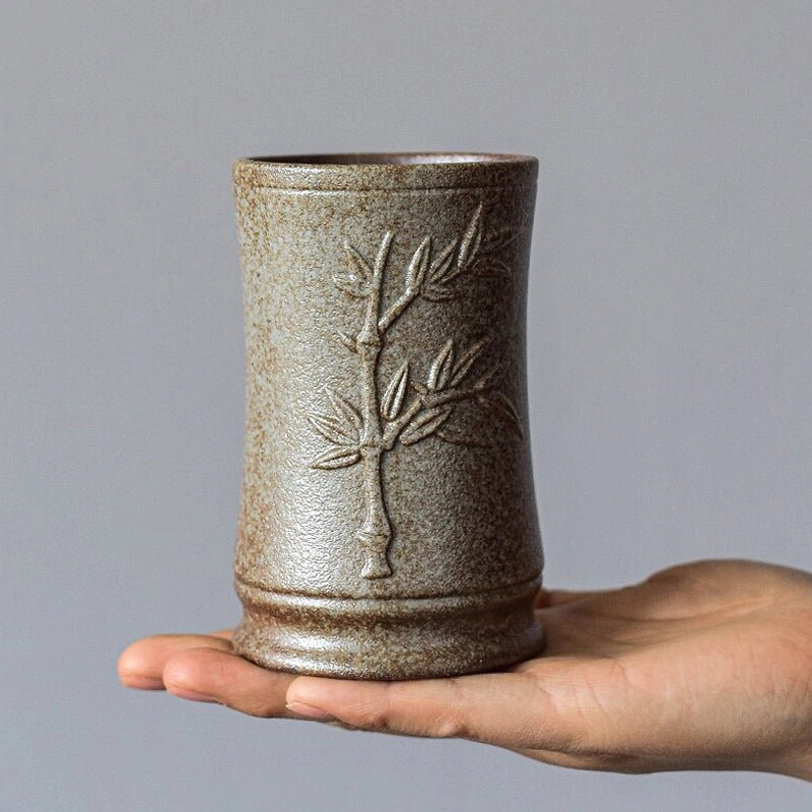 size comparison of compact 220ml bamboo ceramic tea canister