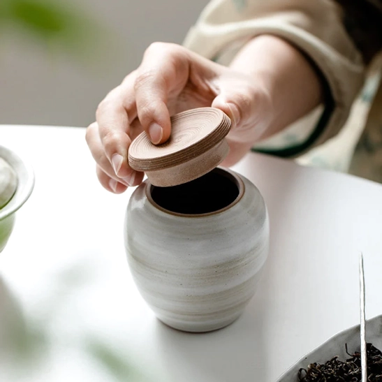 size reference of compact 3.3 inch tall ceramic tea storage canister