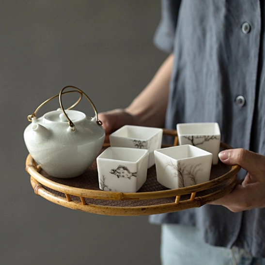 50ml square Chinese tea cup paired with a ceramic teapot on a tea tray