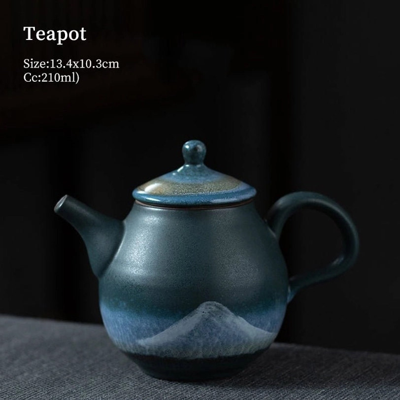 starry sky gradient mountain pattern detail on ceramic teapot