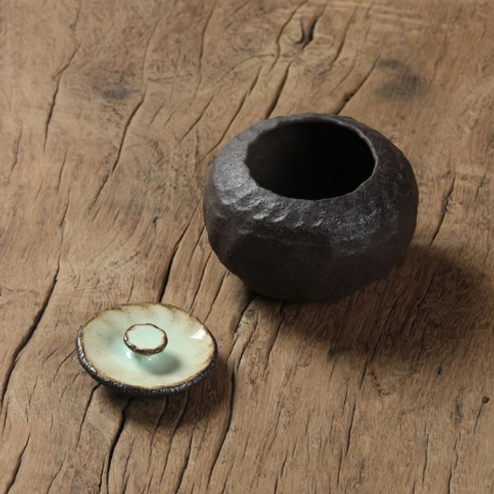 textured stoneware body detail of handmade ceramic tea storage canister