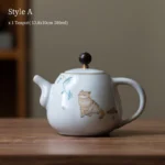 Style A 280ml cat design ceramic teapot with infuser front view