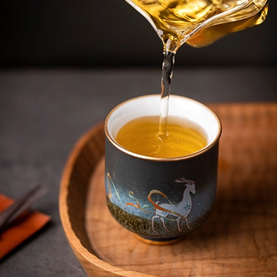 side view of red style C festive panda chinese ceramic tea cup