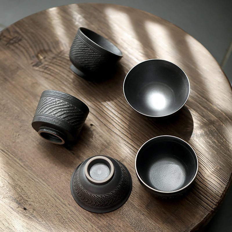 side view of style D 90ml textured black ceramic tea cup