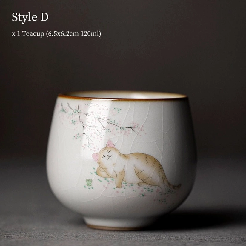 style d cat motif chinese ceramic tea cup placed on wooden table