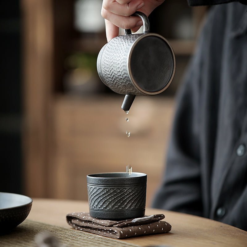 side view of style E 100ml textured black ceramic tea cup