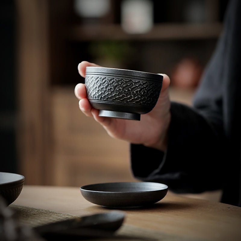 side view of style F 60ml small textured black ceramic tea cup