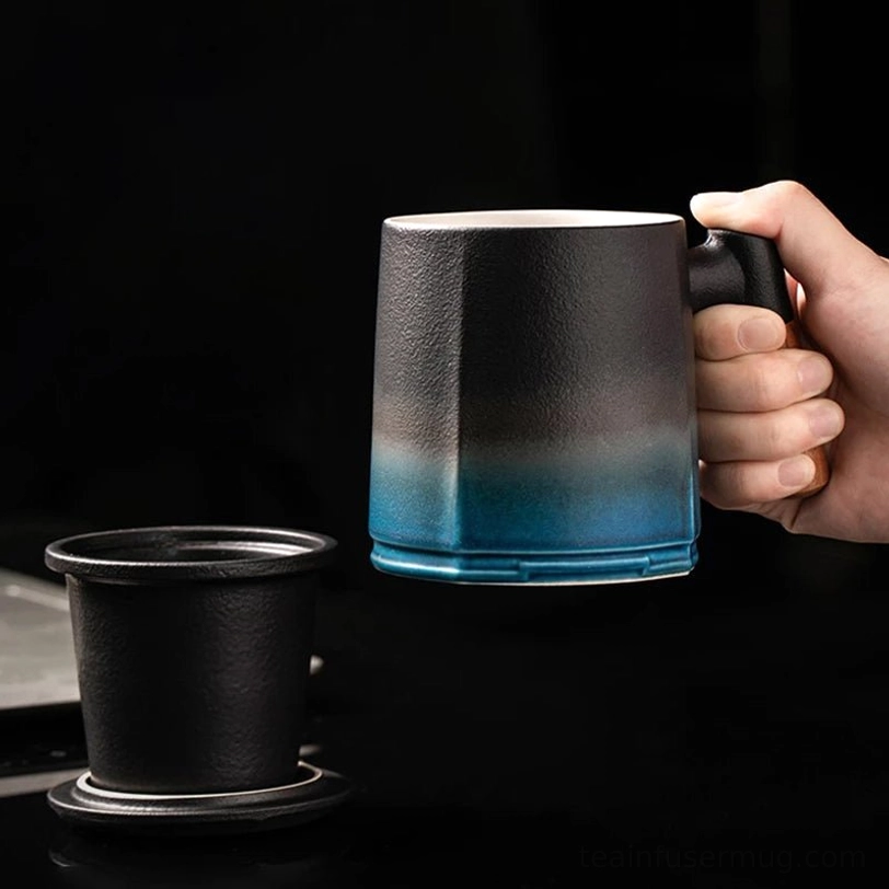 side view of black blue gradient tea infuser mug with heat-resistant wooden handle