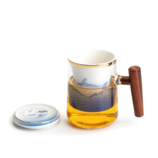 close up of solid wood heat-resistant handle and gold rim detailing on tea infuser mug