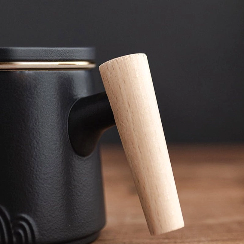 tea infuser resting on matching lid after brewing loose leaf tea