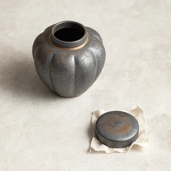 Cotton linen sealing gasket that improves seal for the tea storage canister