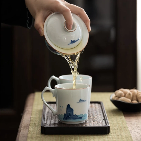 Group display of three motif modern Chinese ceramic tea cups