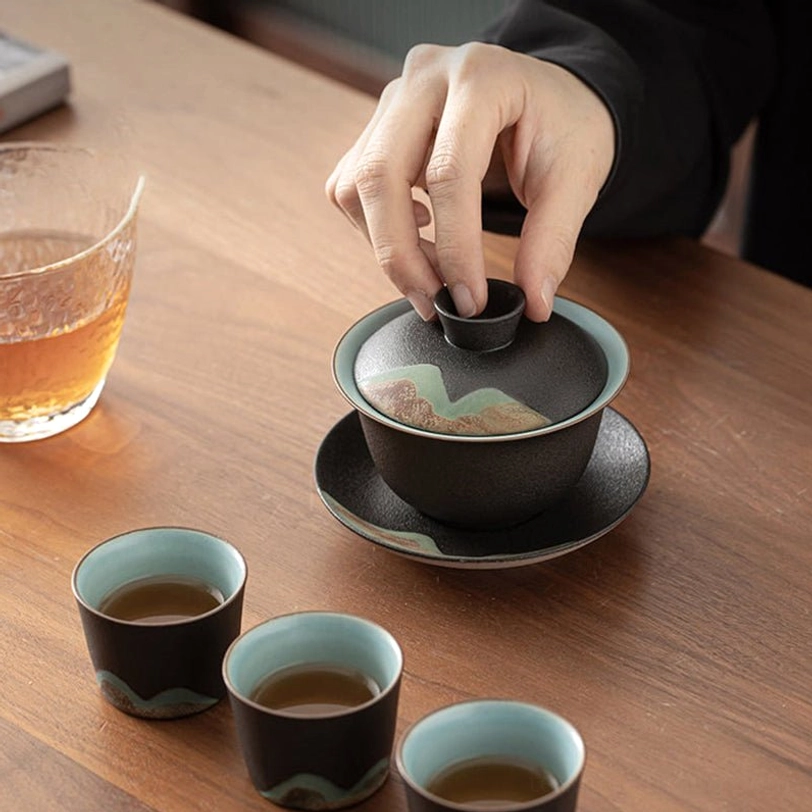 gaiwan with lid lifted showing three-piece set structure