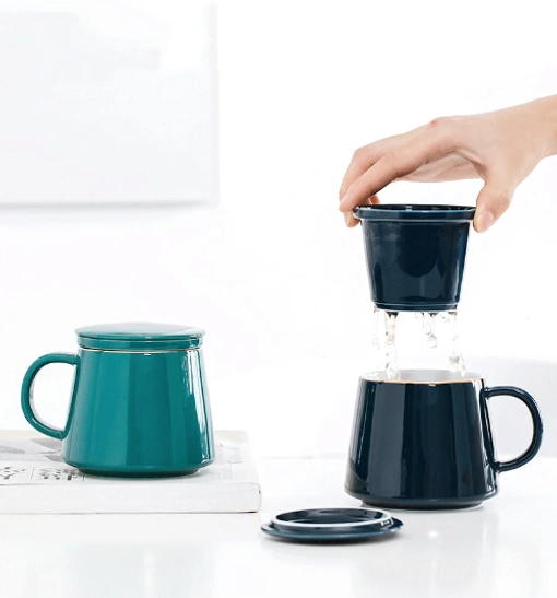 Top view of ceramic tea infuser mug showing built-in infuser lid