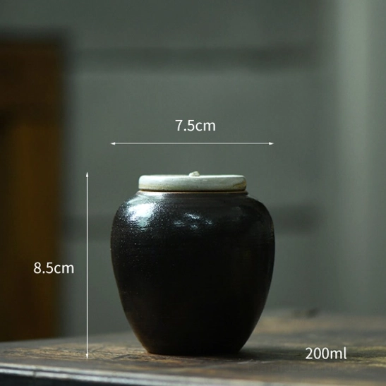 Top view of closed small ceramic loose leaf tea storage canister