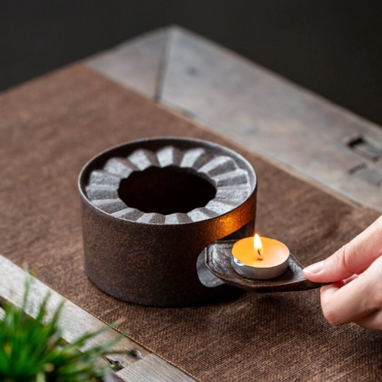 top view of kyusu teapot showing built-in infuser filter holes