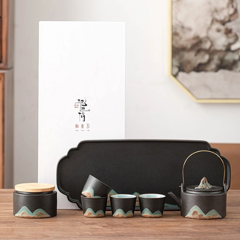 top view of mountain pattern ceramic teapot with infuser lid