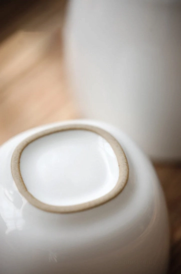top view of open ceramic tea storage jar