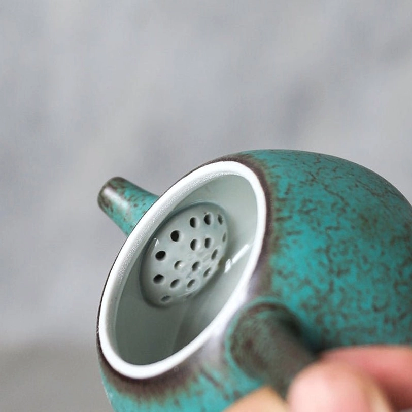 top view of vintage turquoise gongfu tea ceramic teapot