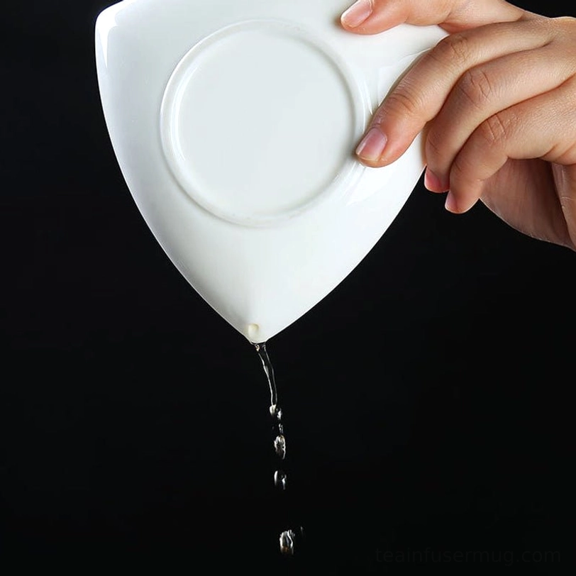 translucent white porcelain gaiwan holding brewed tea showing glaze clarity