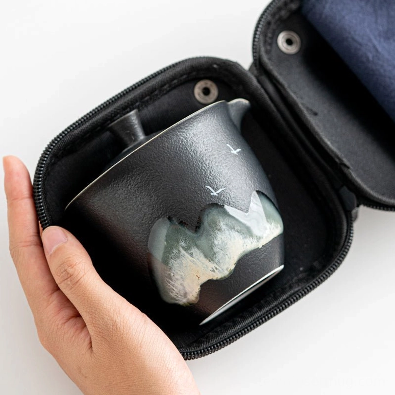 black ceramic teapot with traditional Chinese mountain bird artwork for travel tea set