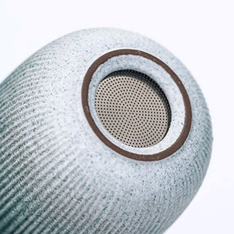 close up of ceramic tea cups with gradient blue green color and textured finish