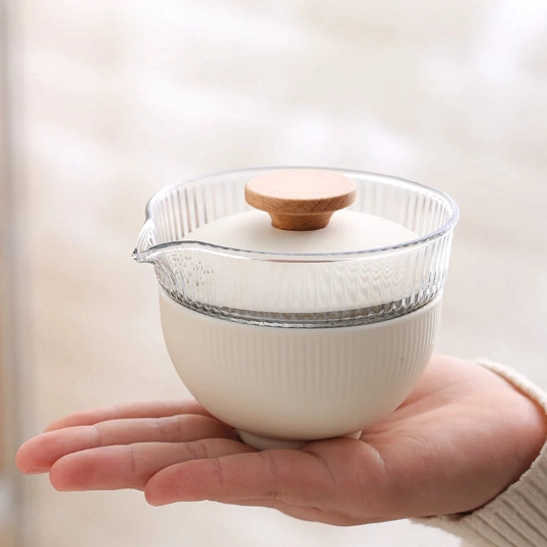 portable travel tea set with glass gaiwan and nested ceramic cups
