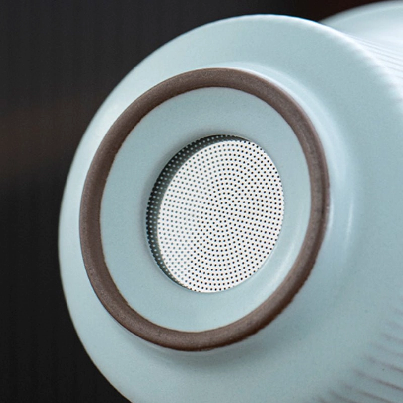 Nested compact arrangement of travel tea set for storage