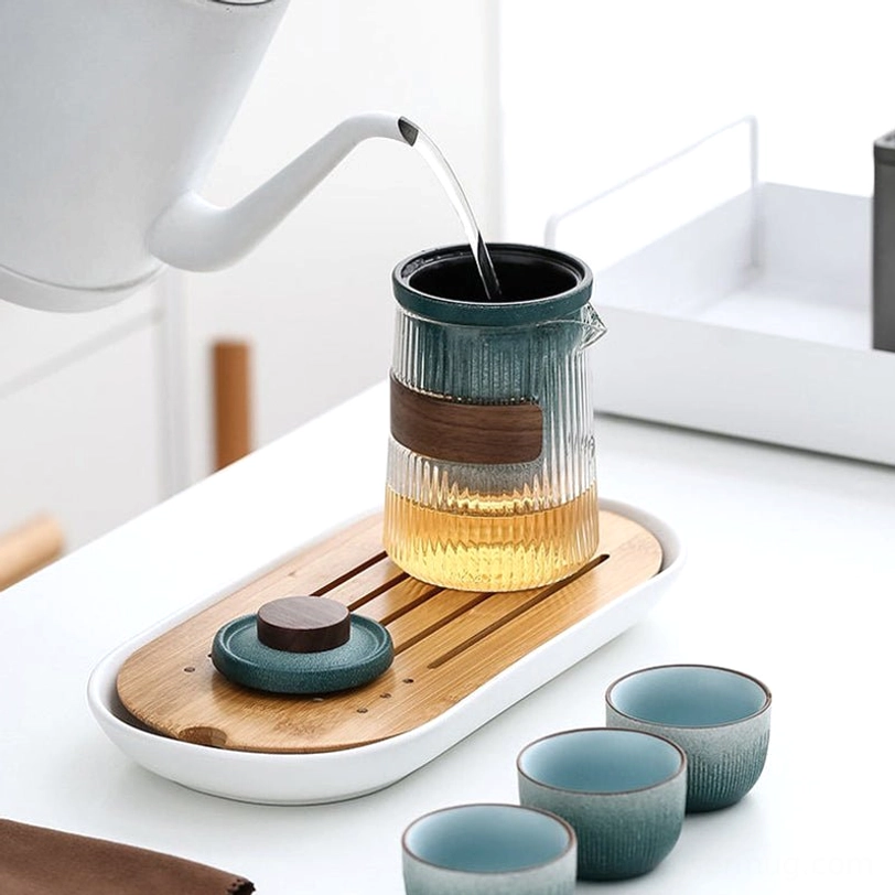 open travel tea set carrying bag showing fitted internal storage for all components