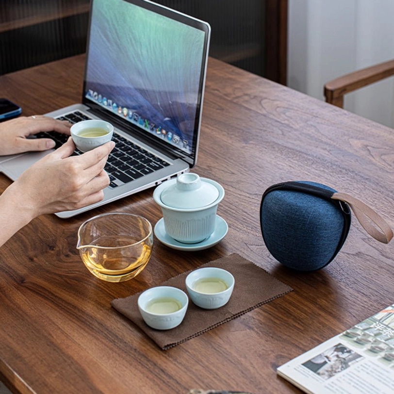 Full travel tea set packed in dark blue canvas travel carry bag