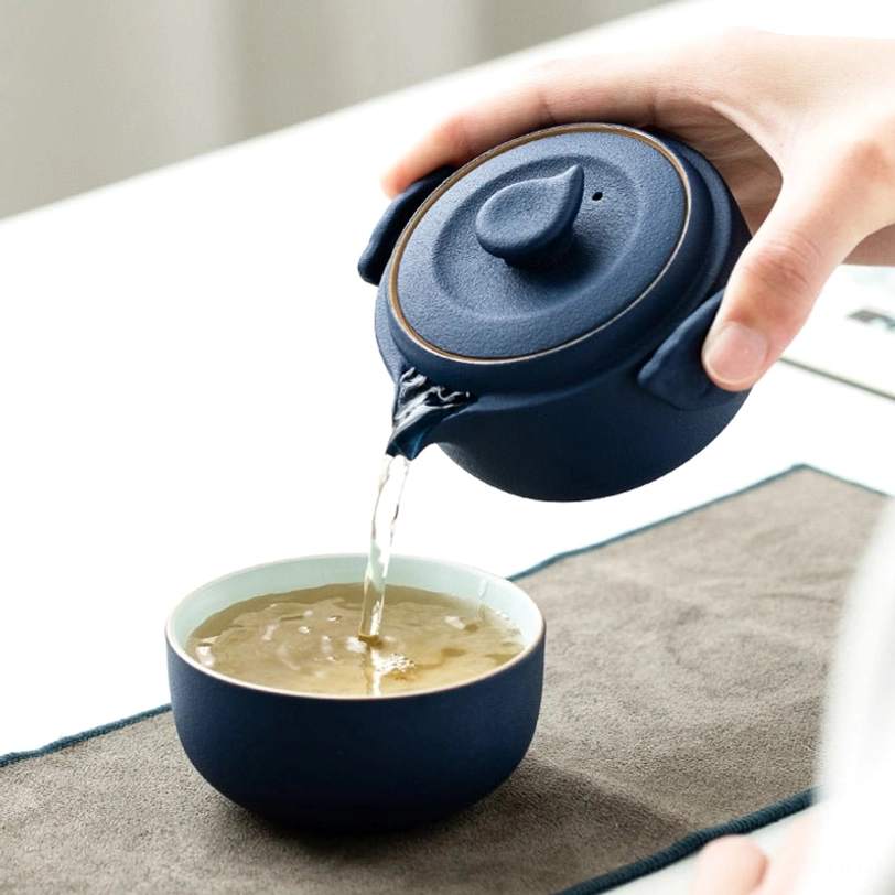 Travel tea set packed in carrying case showing how it fits inside