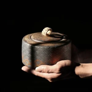 full view of vintage bronze wave pattern ceramic tea storage canister