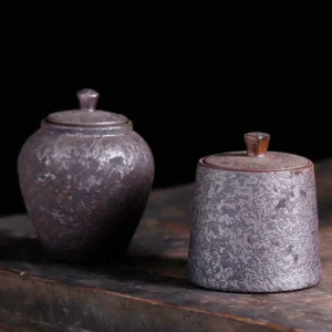 full product view of vintage chinese ceramic tea canister on wood background