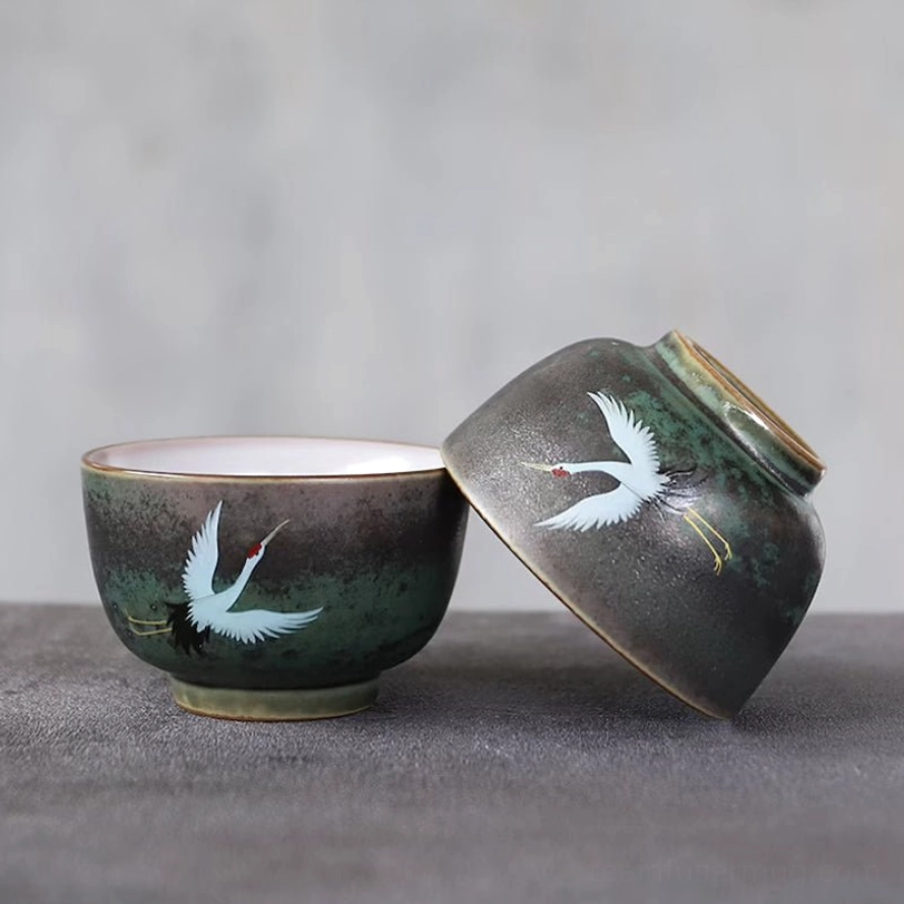vintage chinese crane tea cup top view showing white interior glaze