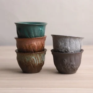 full collection of vintage embossed floral chinese tea cups