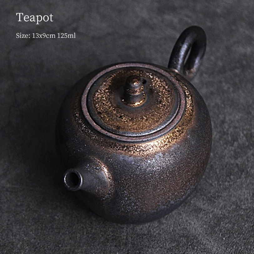 angle view showing spout of 125ml vintage gilded ceramic teapot