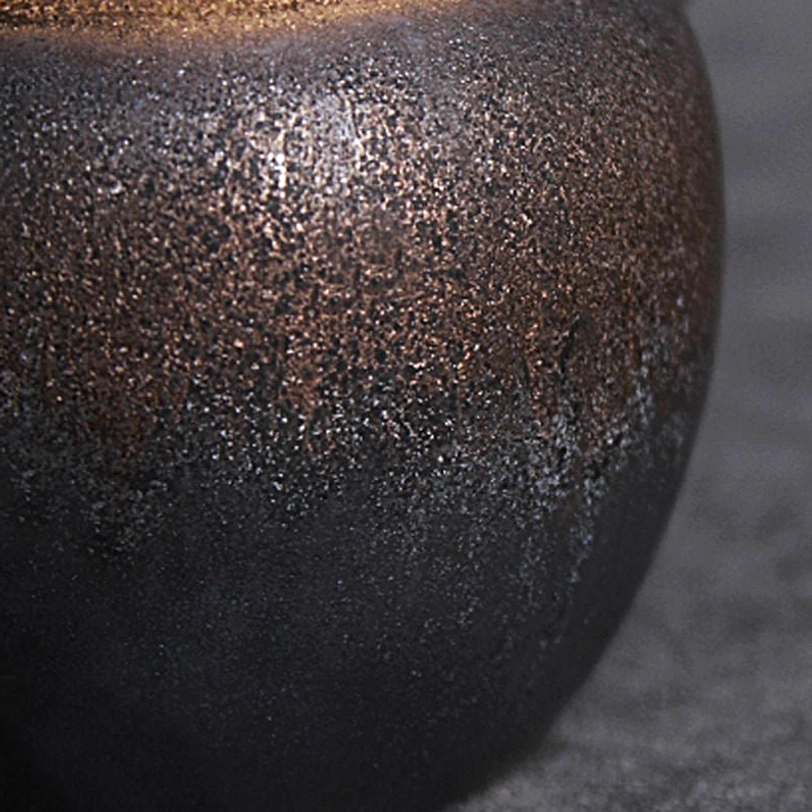 top view of vintage gilded ceramic teapot opening