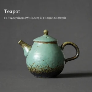 vintage green ceramic teapot with built-in infuser front view