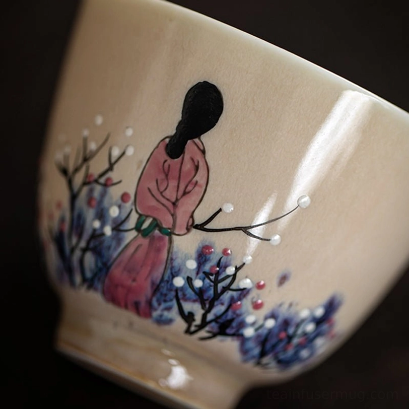 hand decorated vintage japanese tea cup held for size reference