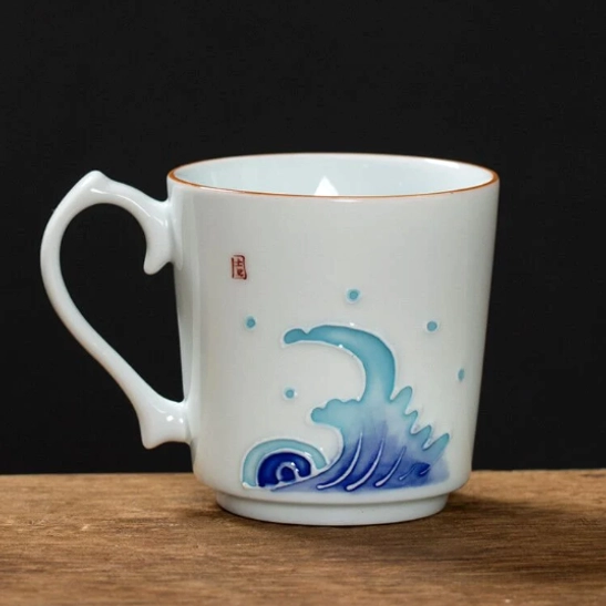 Wave motif modern Chinese ceramic tea cup side view