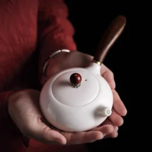 full view of 190ml white ceramic kyusu teapot with wooden side handle