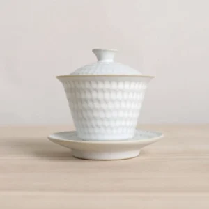 160ml white sancai gaiwan tea cup with embossed texture and gold trim full view