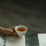 full view of 45ml white lotus petal rim chinese porcelain tea cup